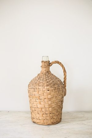 Woven wicker bottle